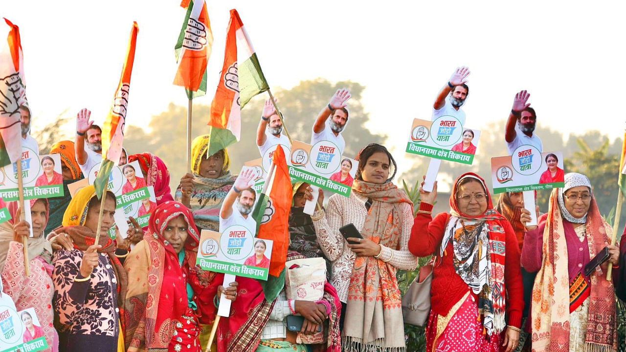 Congress women supporters hold placards during 'Bharat Jodo Yatra', in Dausa district, Rajasthan. Credit: IANS Photo