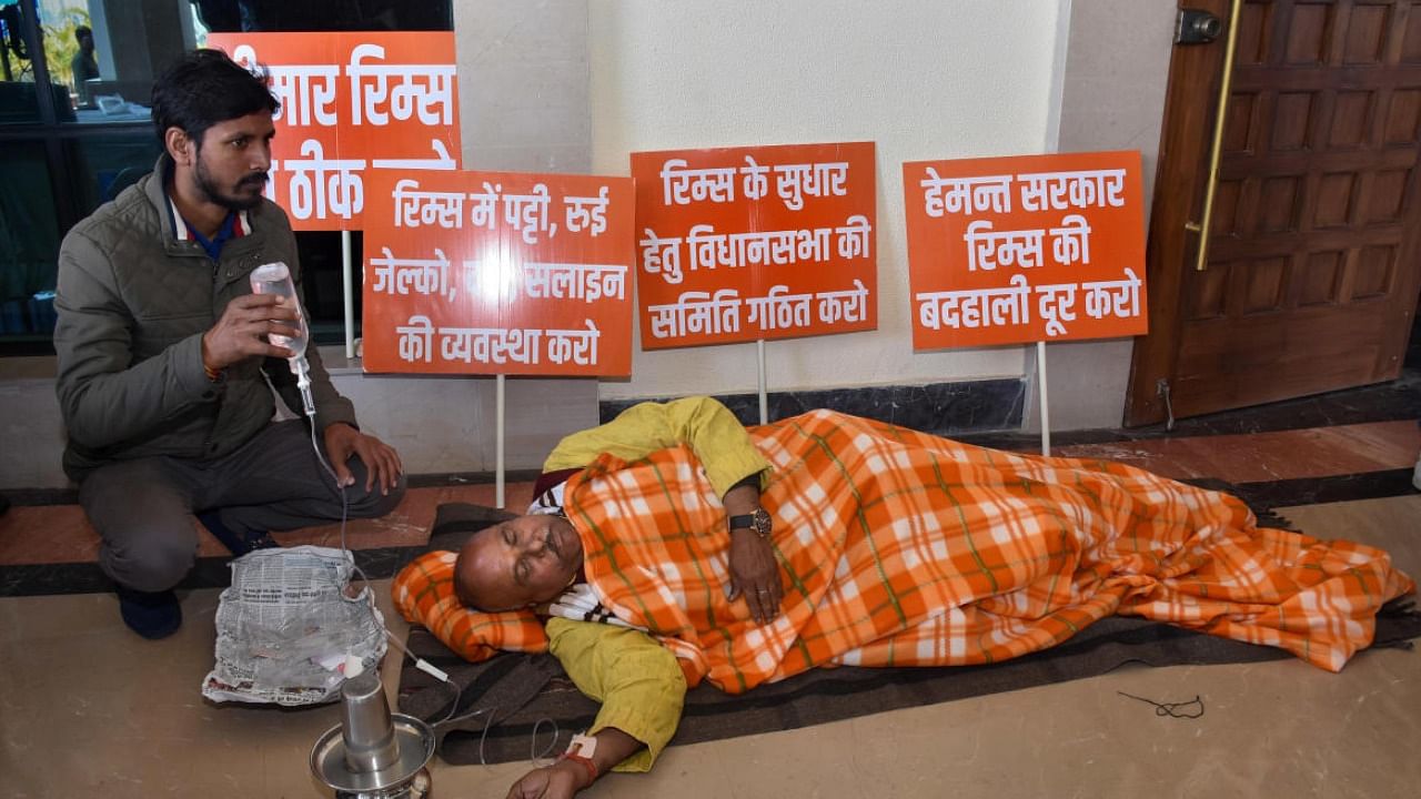 BJP MLA from Kanke, Sammari Lal stages a protest against Jharkhand Chief Minister Hemant Soren over the condition of medical services at RIMS Hospital. credit: PTI