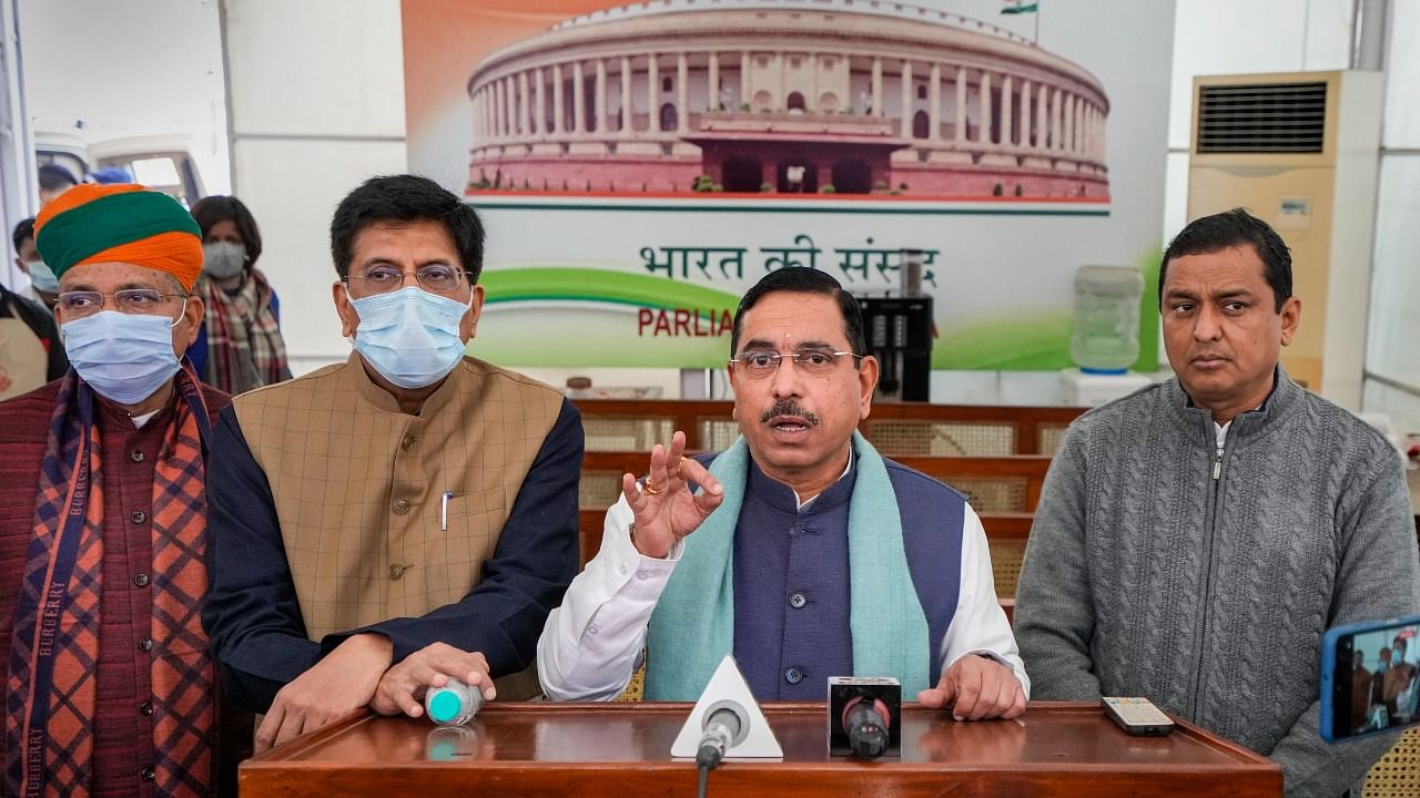 Union Minister for Parliamentary Affairs Pralhad Joshi addresses a press conference at Parliament House complex during Winter Session, in New Delhi, Thursday, Dec. 22, 2022. Union Ministers Piyush Goyal and Arjun Ram Meghwal are also seen. Credit: PTI Photo