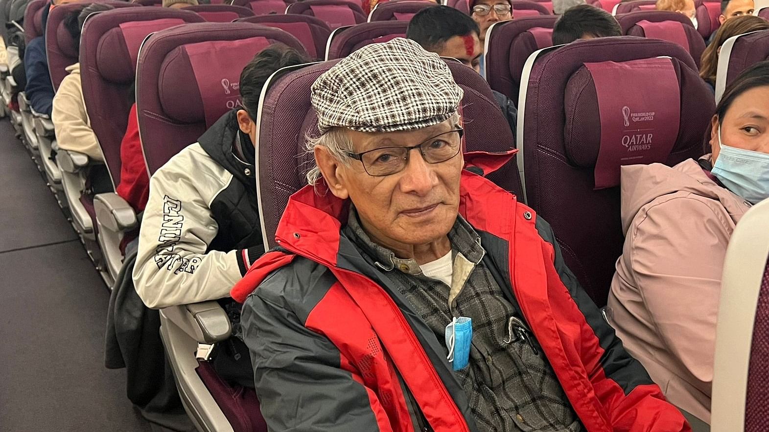 French serial killer Charles Sobhraj sits in an aircraft from Kathmandu to France, on December 23, 2022. Credit: AFP Photo