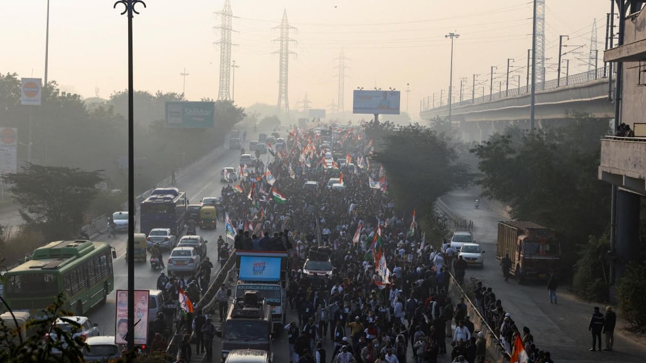 People take part in Bharat Jodo Yatra in New Delhi. Credit: Reuters Photo