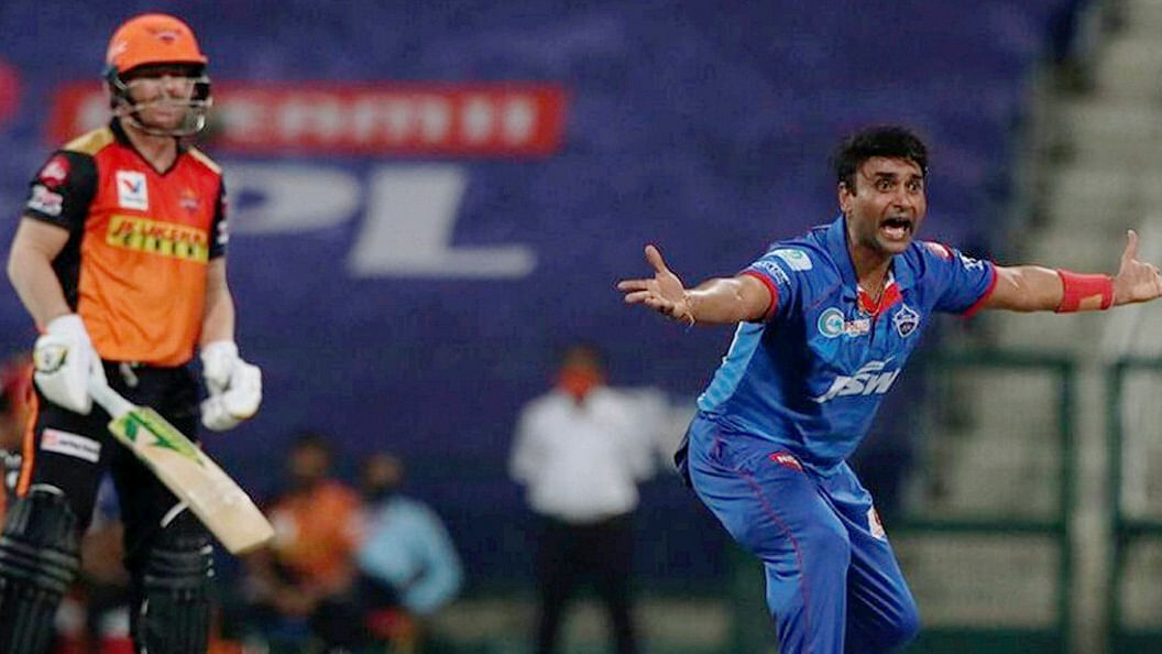 Delhi Capitals player Amit Mishra appeals successfully for the wicket Sunrisers Hyderabad batsman David Warner during the Indian Premier League 2020 cricket match, at Sheikh Zayed Stadium, Abu Dhabi, Tuesday, Sept. 29, 2020. Credit: PTI File Photo 