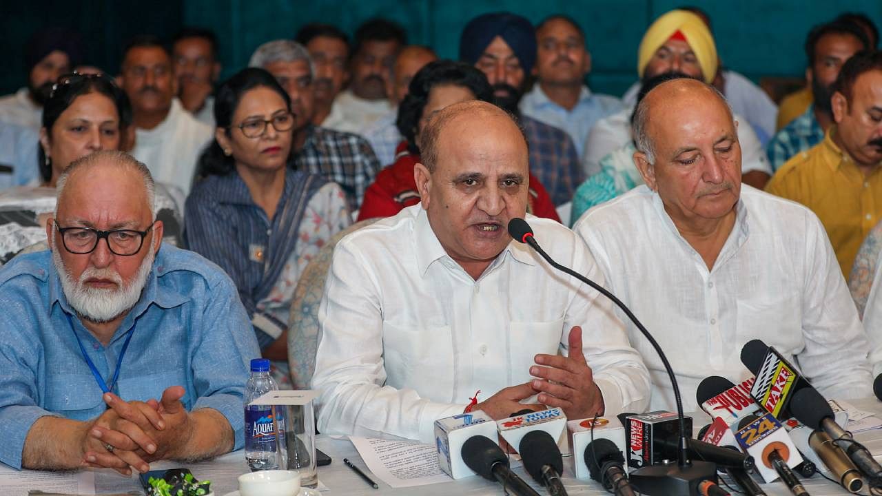 Former J&K deputy chief minister Tara Chand addresses a press conference in Jammu. Credit: PTI File Photo