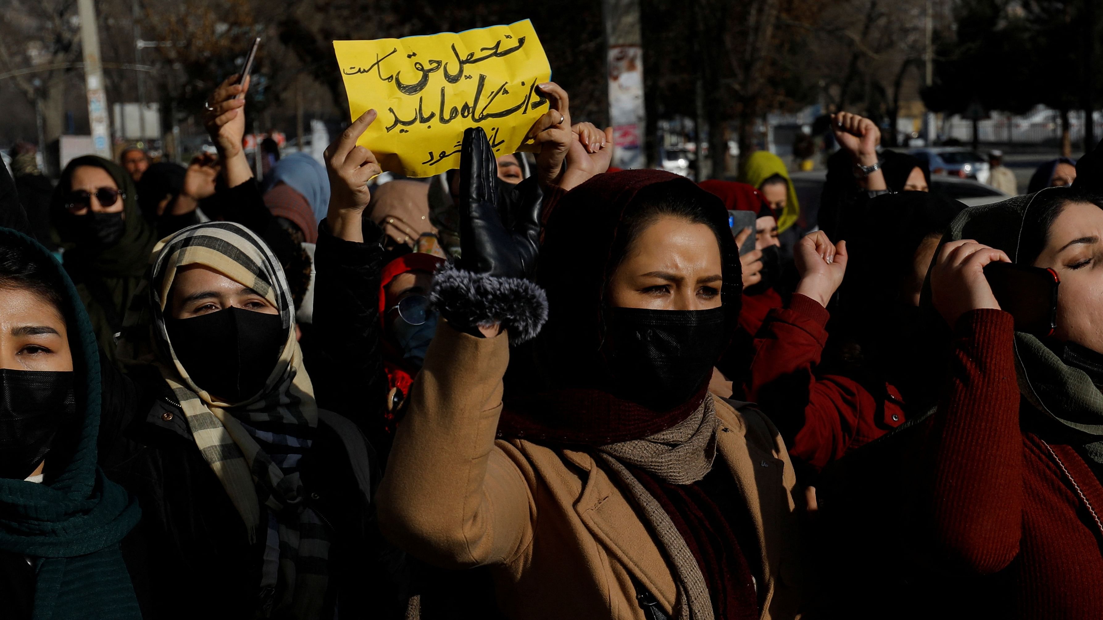 Afghan women chant slogans in protest against the closure of universities to women by the Taliban in Kabul. Credit: Reuters Photo