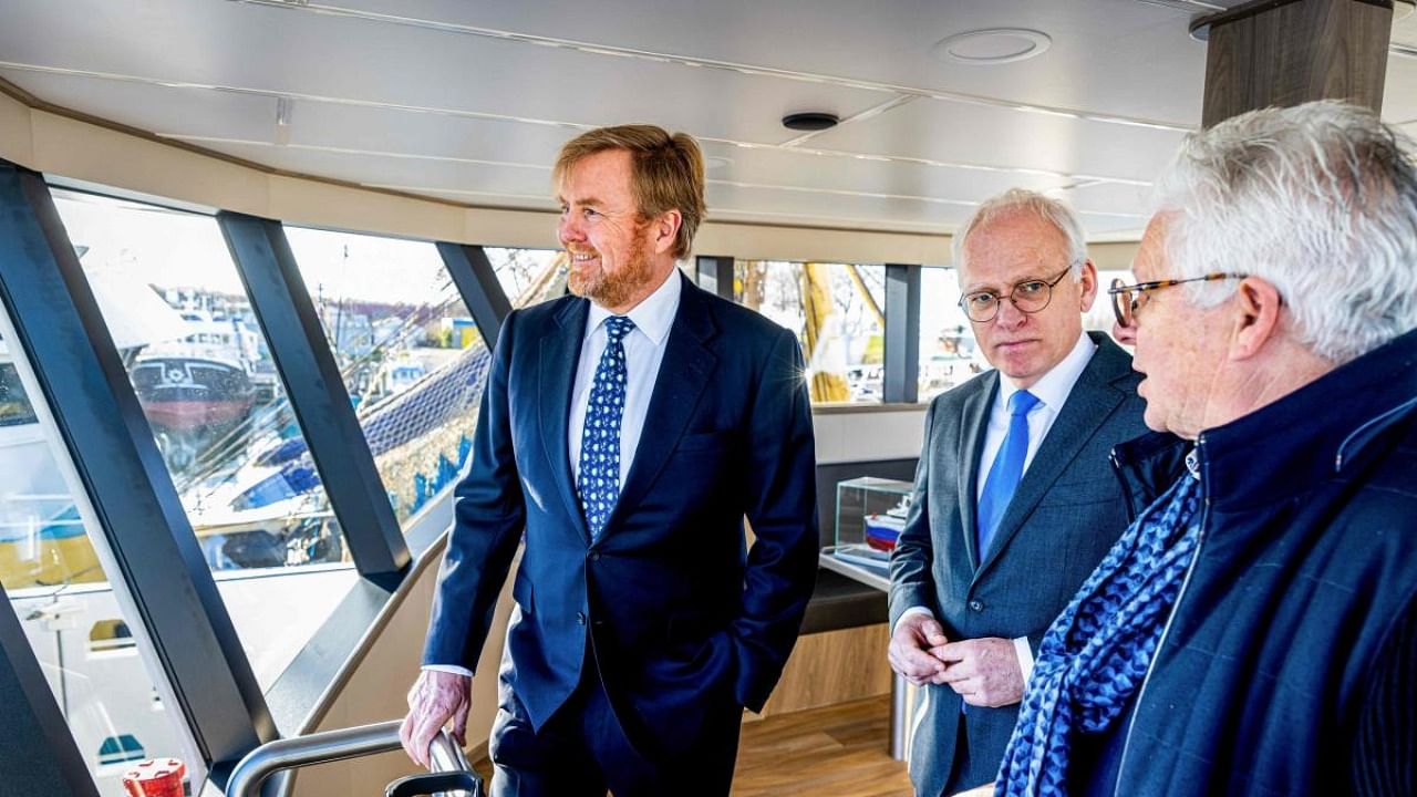 King Willem-Alexander of the Netherlands (left). Credit: AFP Photo