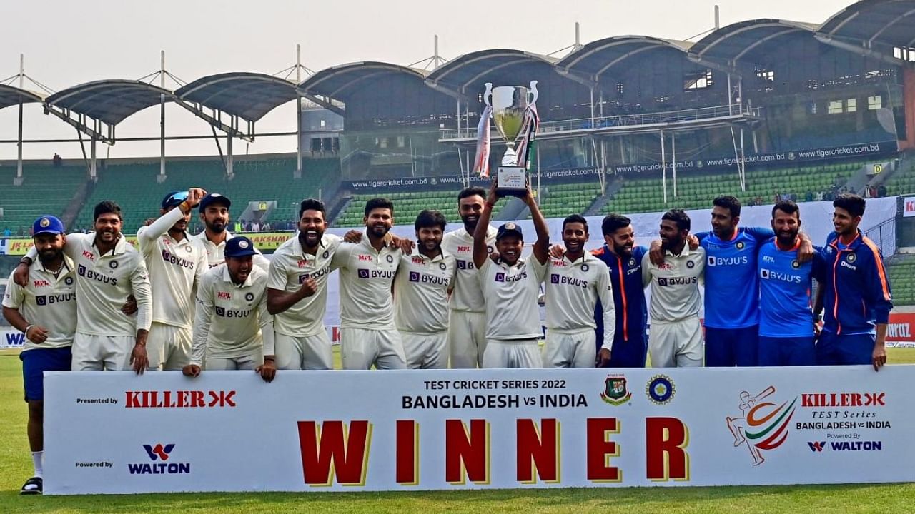 India team lifts the tournament trophy after winning on the fourth day of the second cricket Test match between Bangladesh and India at the Sher-e-Bangla National Cricket Stadium. Credit: AFP Photo