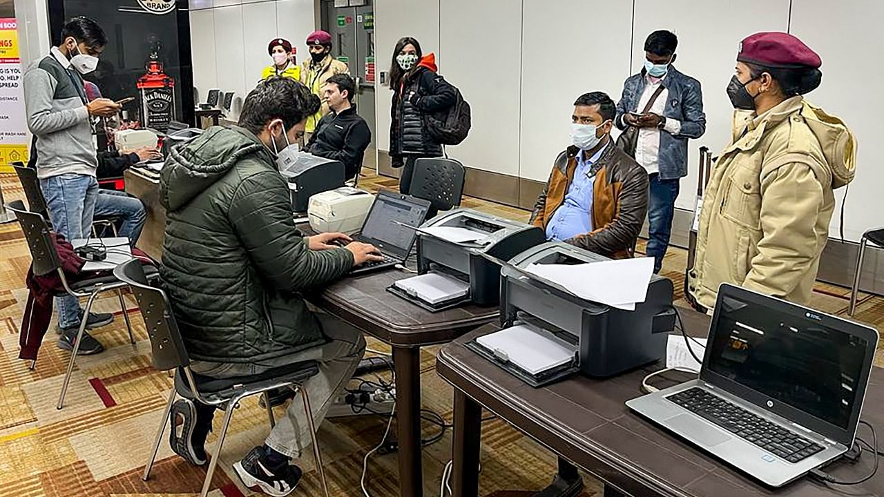 Air passengers undergo screening for Covid-19 tests at the IGI airport. Credit: PTI Photo