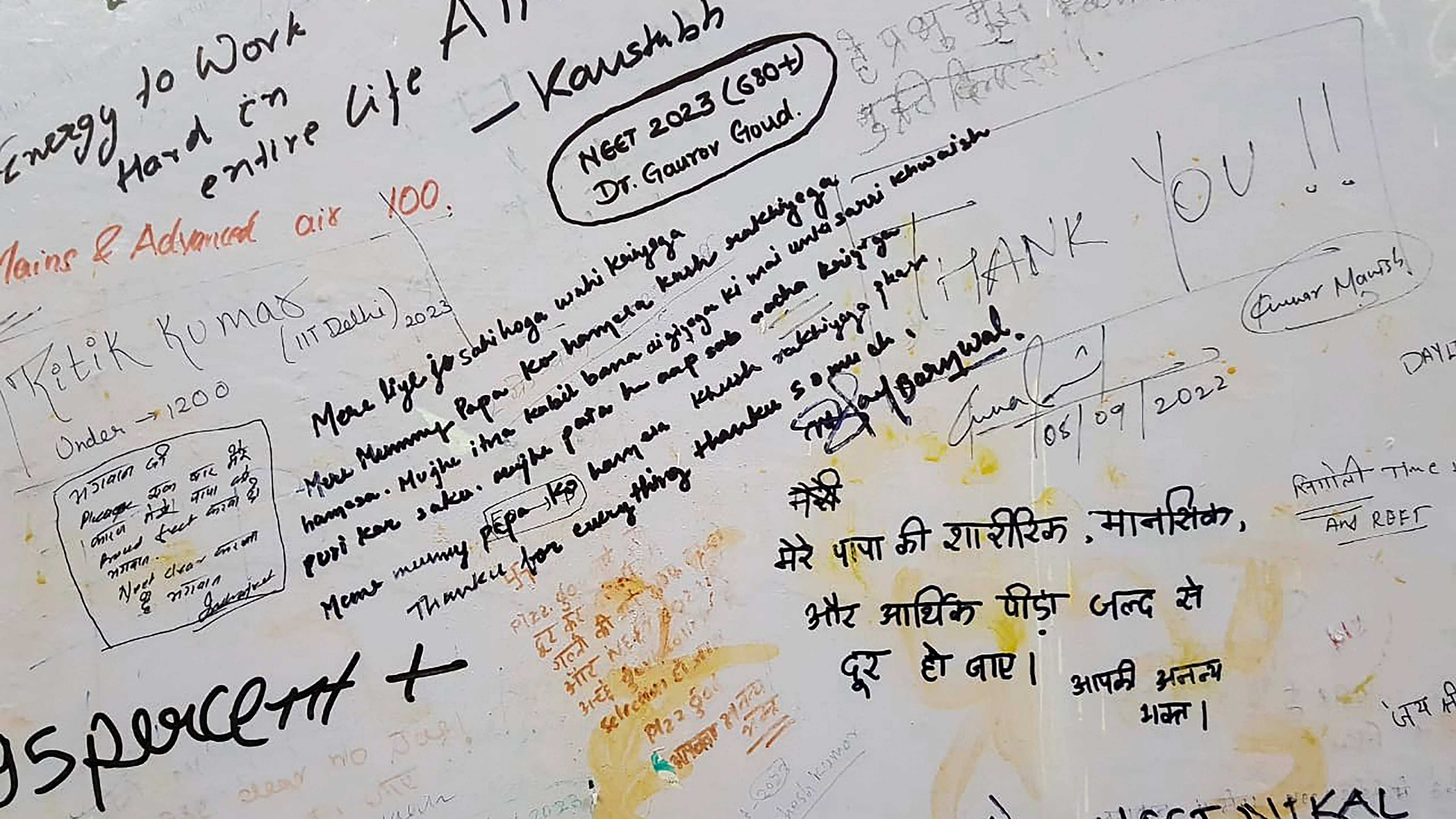 Wishes scribbled by JEE, NEET coaching students on ‘wall of beliefs’ at Radha Krishna Temple in Kota. Credit: PTI Photo
