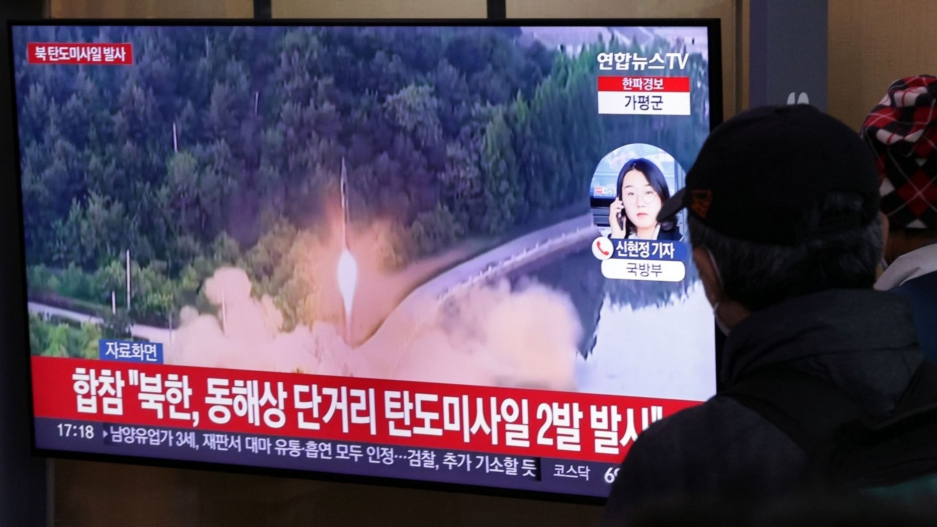 People watch a TV report at Seoul Station on Dec. 23, 2022, about North Korea's launch of two short-range ballistic missiles into the East Sea. Credit: IANS Photo