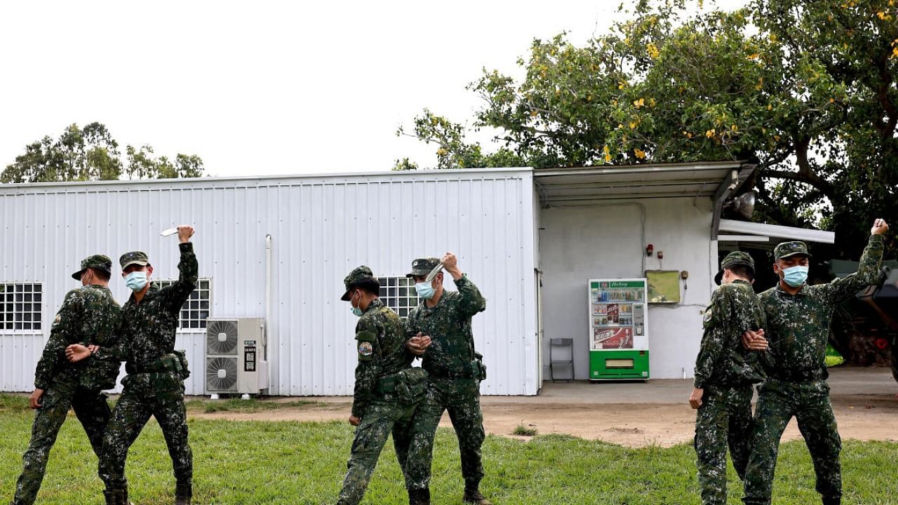 Members of Taiwan's Air Force 'Tiger Band' attend morning duties at the Chihhang Air Base in Taitung, Taiwan. Credit: AFP