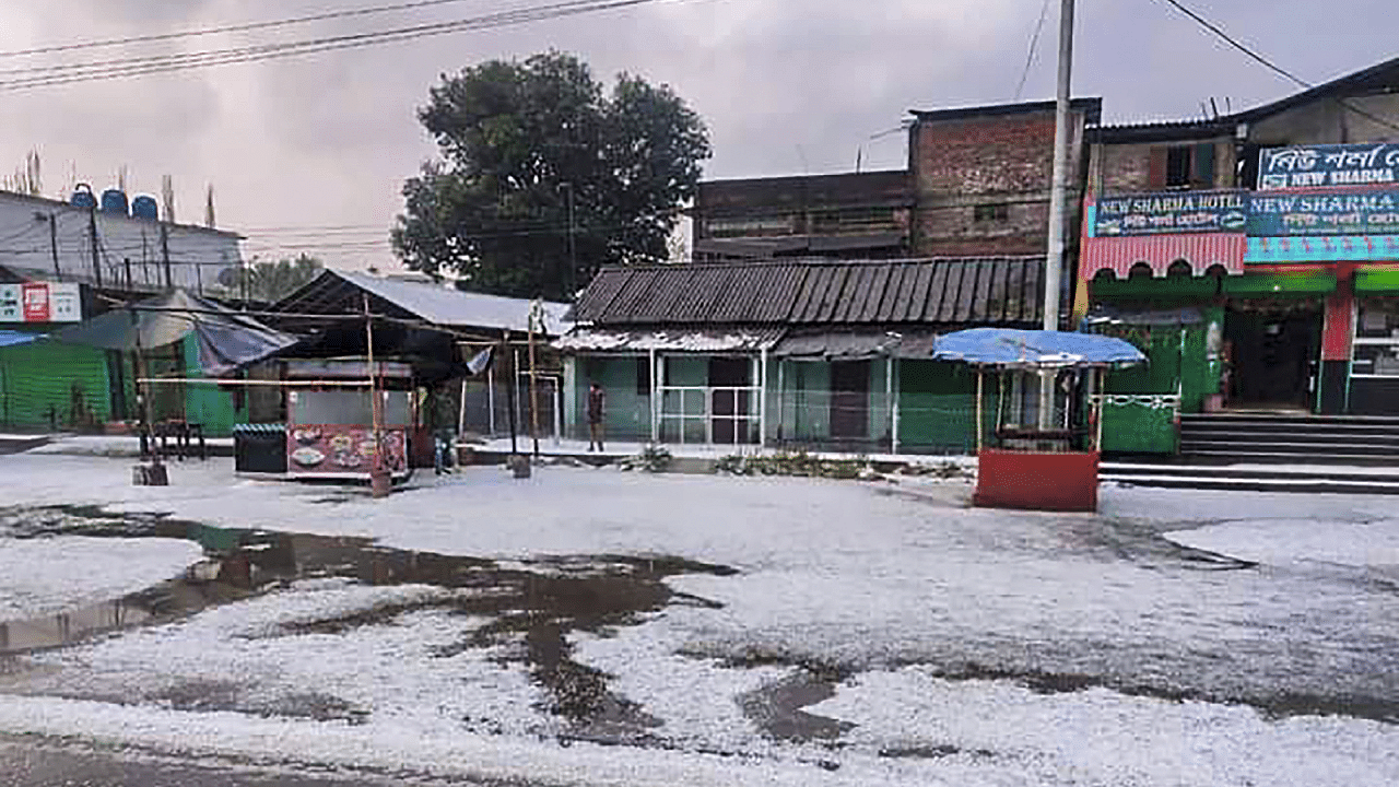 A street is covered in white after hailstorm in Sivasagar district. Credit: PTI Photo