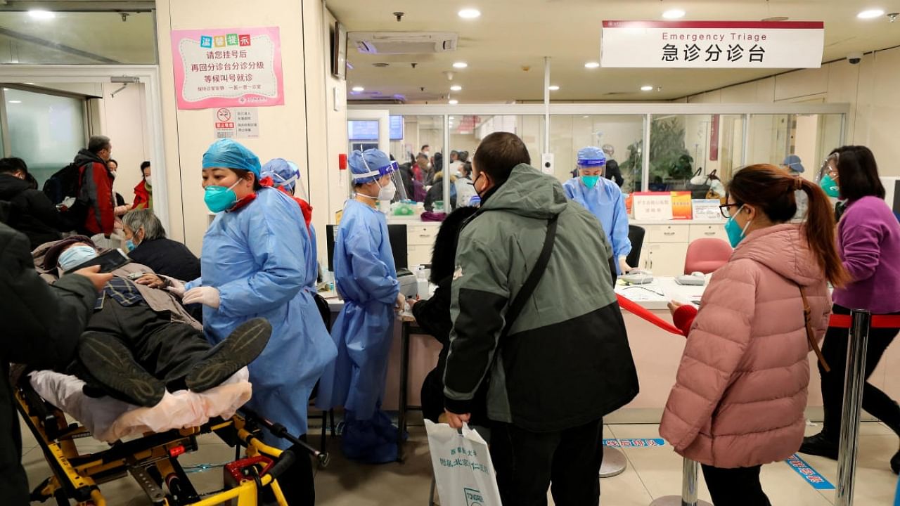 Patients line up for treatment at the emergency department of Beijing Chaoyang hospital, amid the coronavirus disease outbreak in Beijing. Credit: Reuters Photo