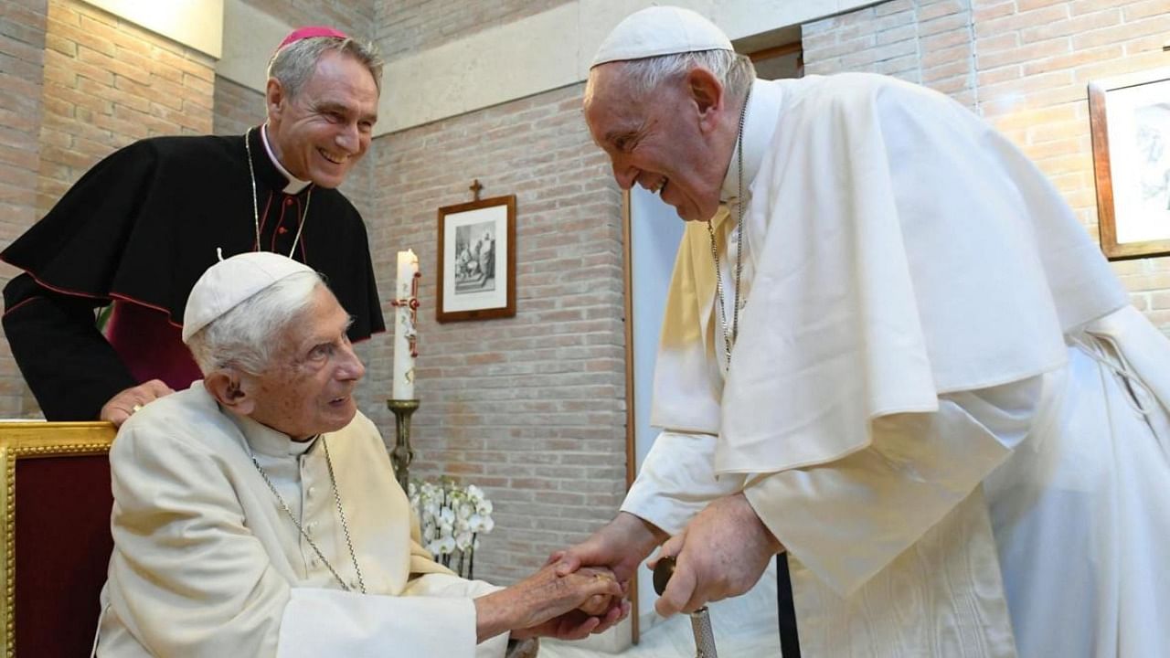 Pope Francis (R) salute Pope Emeritus Benedict. Credit: AFP File Photo