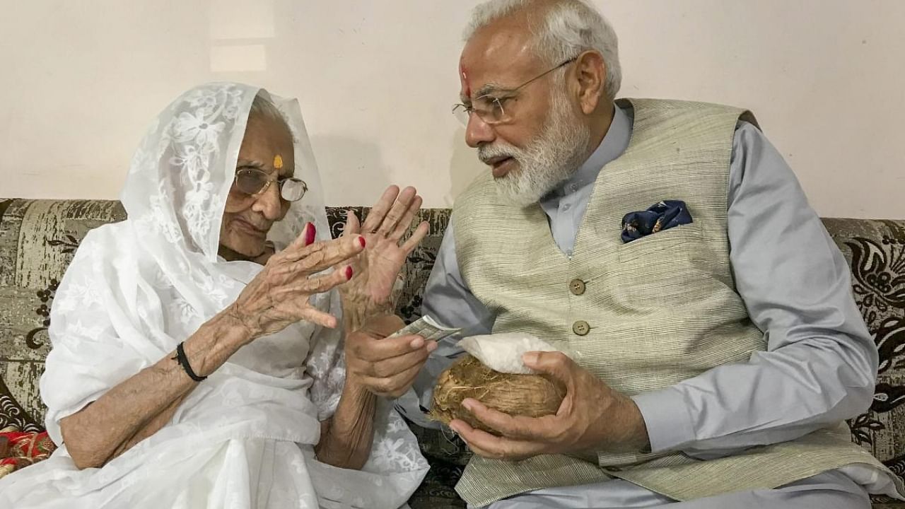 Modi and his mother Heeraba. Credit: PTI Photo