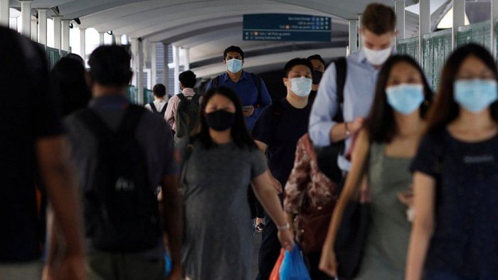 Commuters leave a train station during the coronavirus disease outbreak, in Singapore. Credit: Reuters Photo 