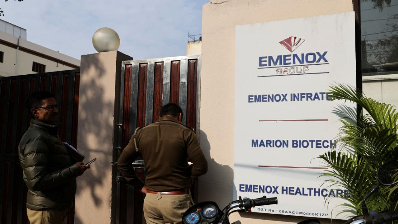 Police is seen at the gate of an office of Marion Biotech, in Noida. Credit: PTI Photo