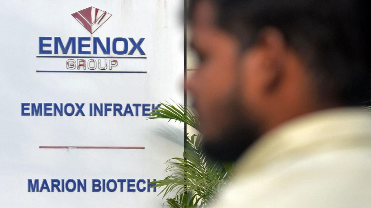 A man walks past the office entrance of Marion Biotech in Noida. Credit: AFP Photo
