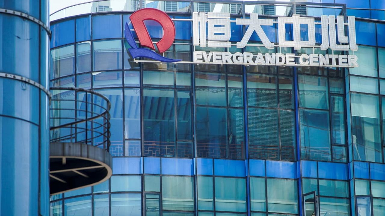 The logo of China Evergrande Group seen on the Evergrande Center in Shanghai, China. Credit: Reuters
