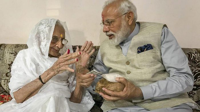 Prime Minister Narendra Modi with his mother. Credit: PTI Photo