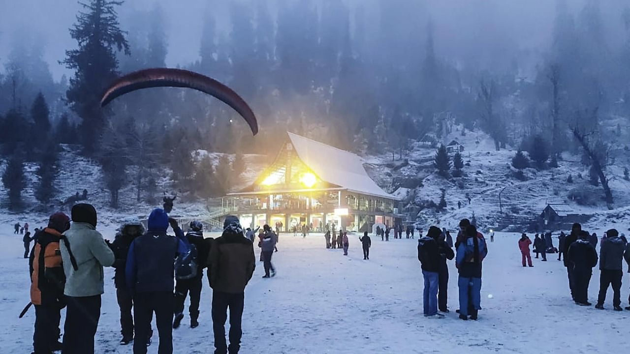 Tourists at Solangnala after fresh snowfall in Manali. Credit: PTI Photo