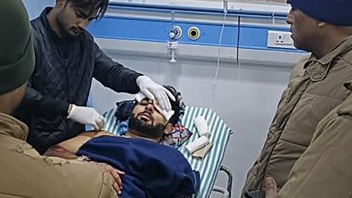Cricketer Rishabh Pant receives treatment at a hospital after his car met with an accident, in Roorkee, Friday, Dec. 30, 2022. Credit: PTI Photo 