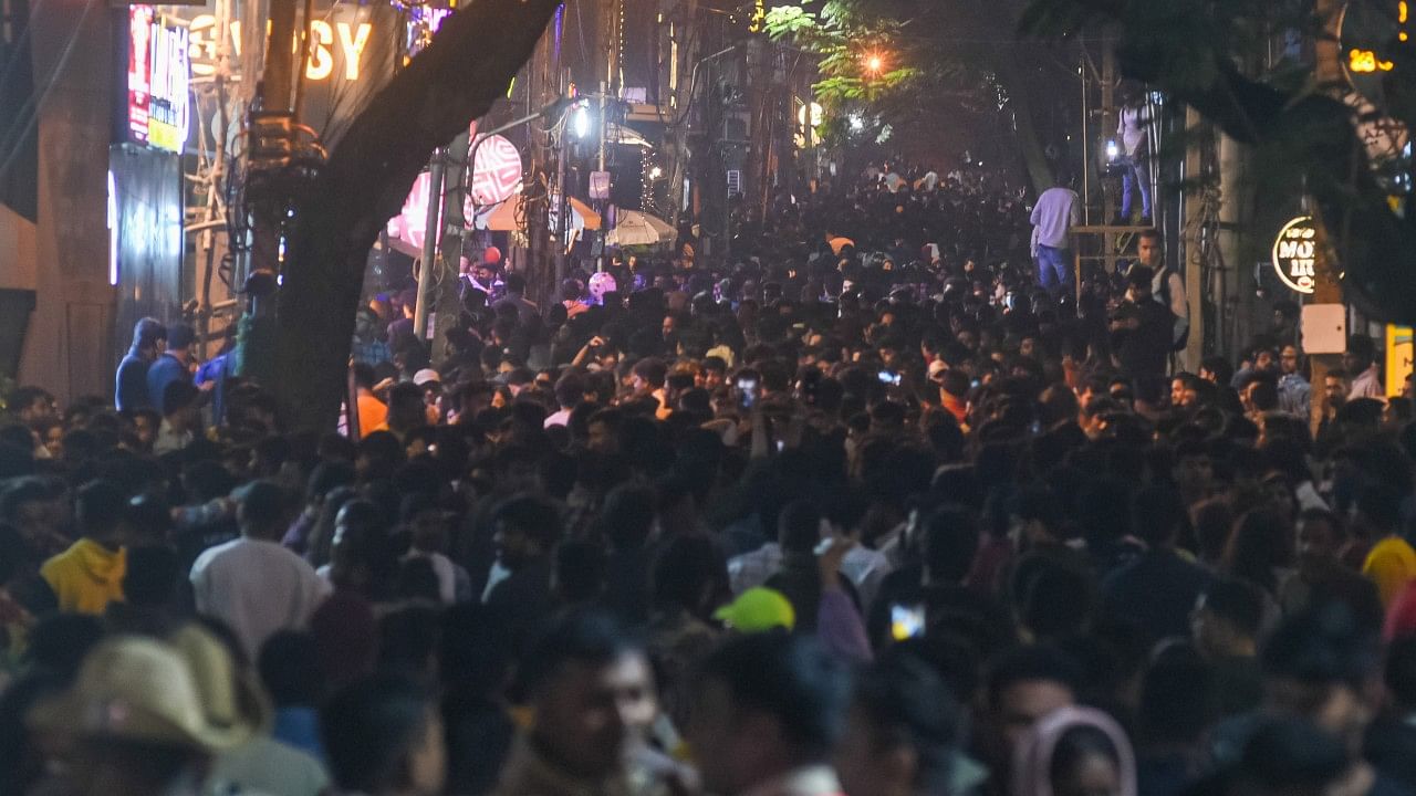 Revelers throng Koramangala to celebrate New Year's Eve. Credit: DH Photo