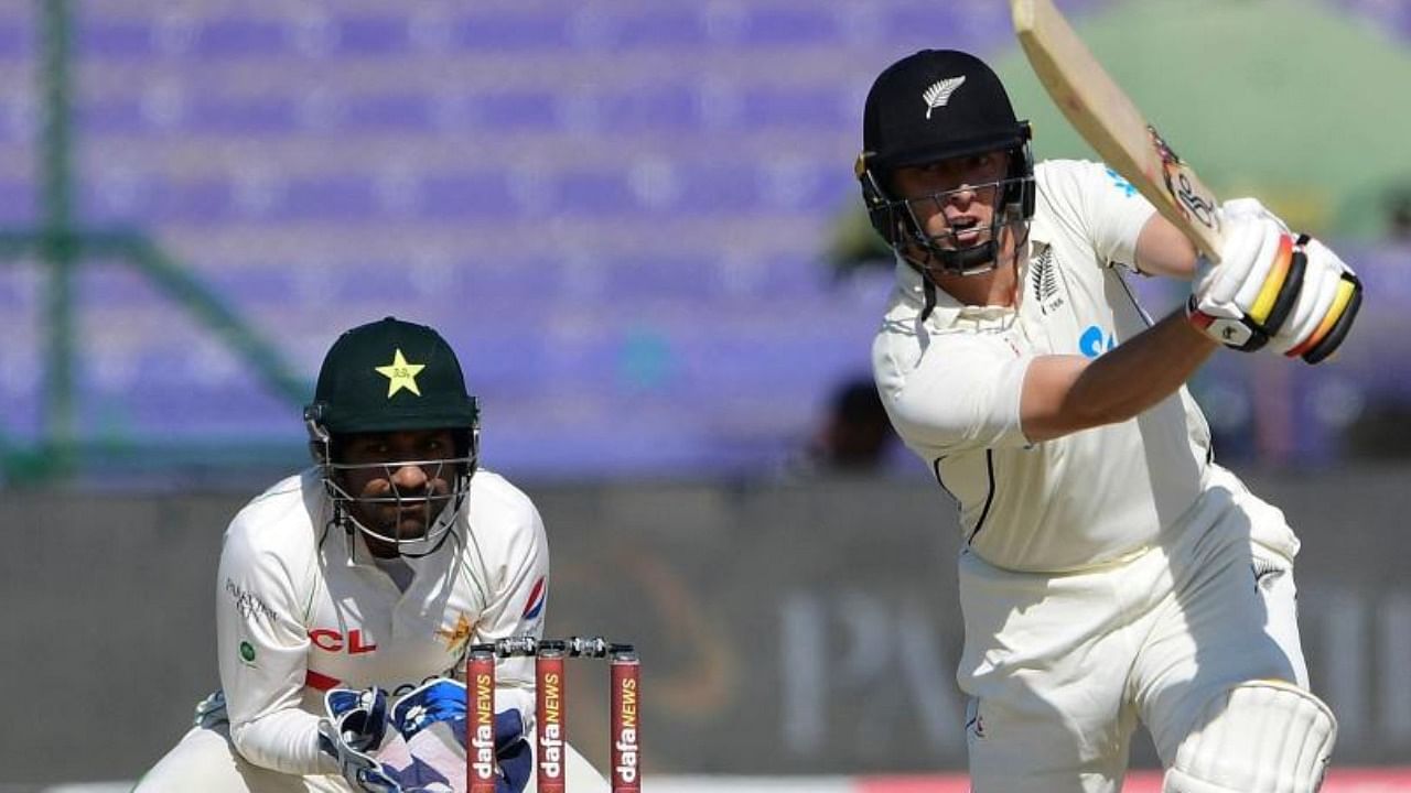 New Zealand's Matt Henry (R) plays a shot during the second day of the second Test match between Pakistan and New Zealand at the National Stadium in Karachi on January 3, 2023. Credit: AFP Photo