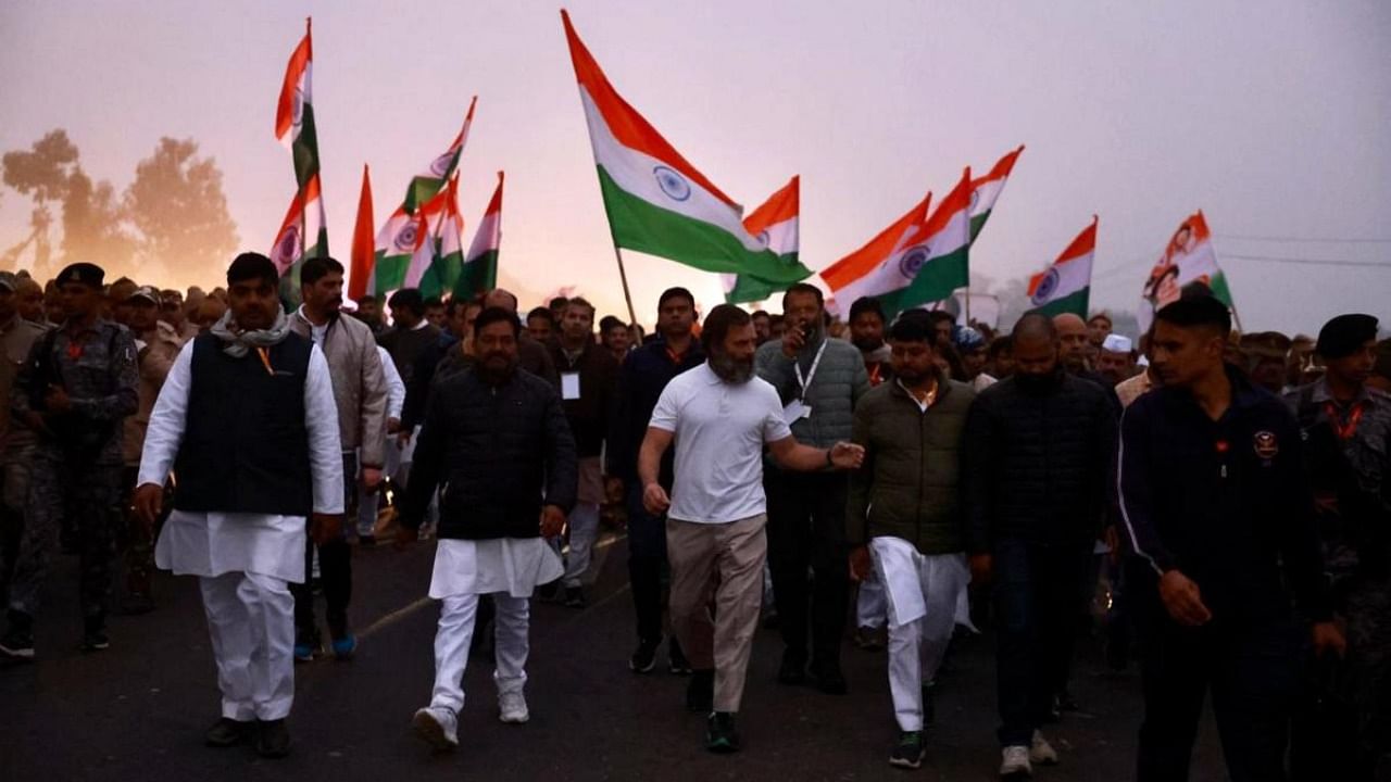 Congress leader Rahul Gandhi with other leaders and supporters after resumption of the Bharat Jodo Yatra from Mavikala village in Baghpat district, early Wednesday morning, Jan. 4, 2023. Credit: PTI Photo