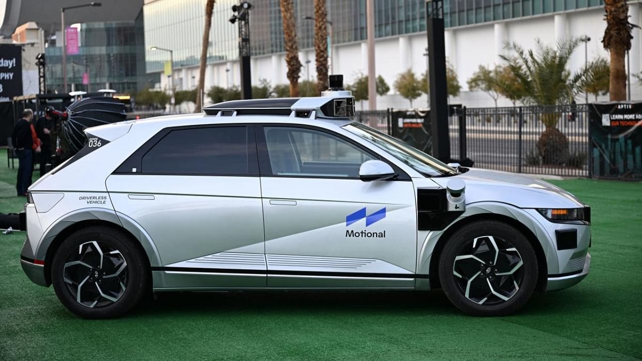 A Motional autonomous driving car is seen at the Aptiv display during set up for the upcoming CES 2023 Consumer Electronics Show. Credit: AFP Photo