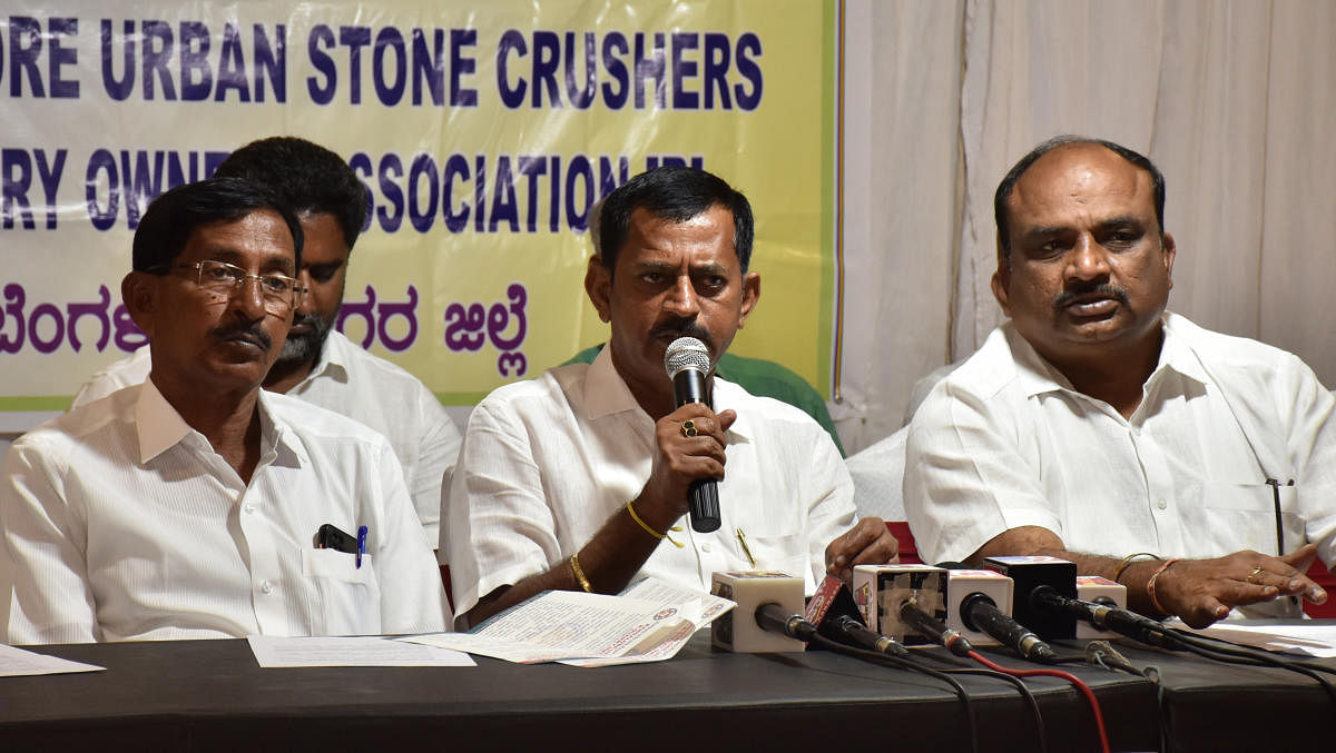 D Siddaraju, president, Bangalore Urban Stone Crushers and Quarry Owners Association, addresses a press conference in Bengaluru on Wednesday. Credit: DH Photo