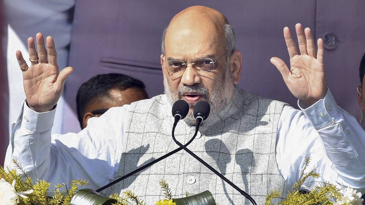 Union Home Minister Amit Shah Minister speaks during a Bharatiya Janata Party rally at Dhamanagar in poll-bound Tripura. Credit: PTI Photo