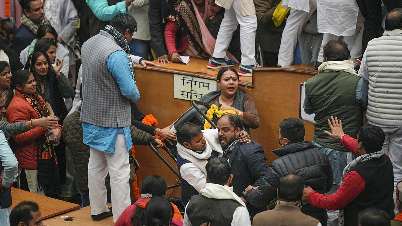 AAP and BJP councilors clash during the election of Mayor and Dy Mayor at the Civic Centre, in New Delhi. Credit: PTI Photo