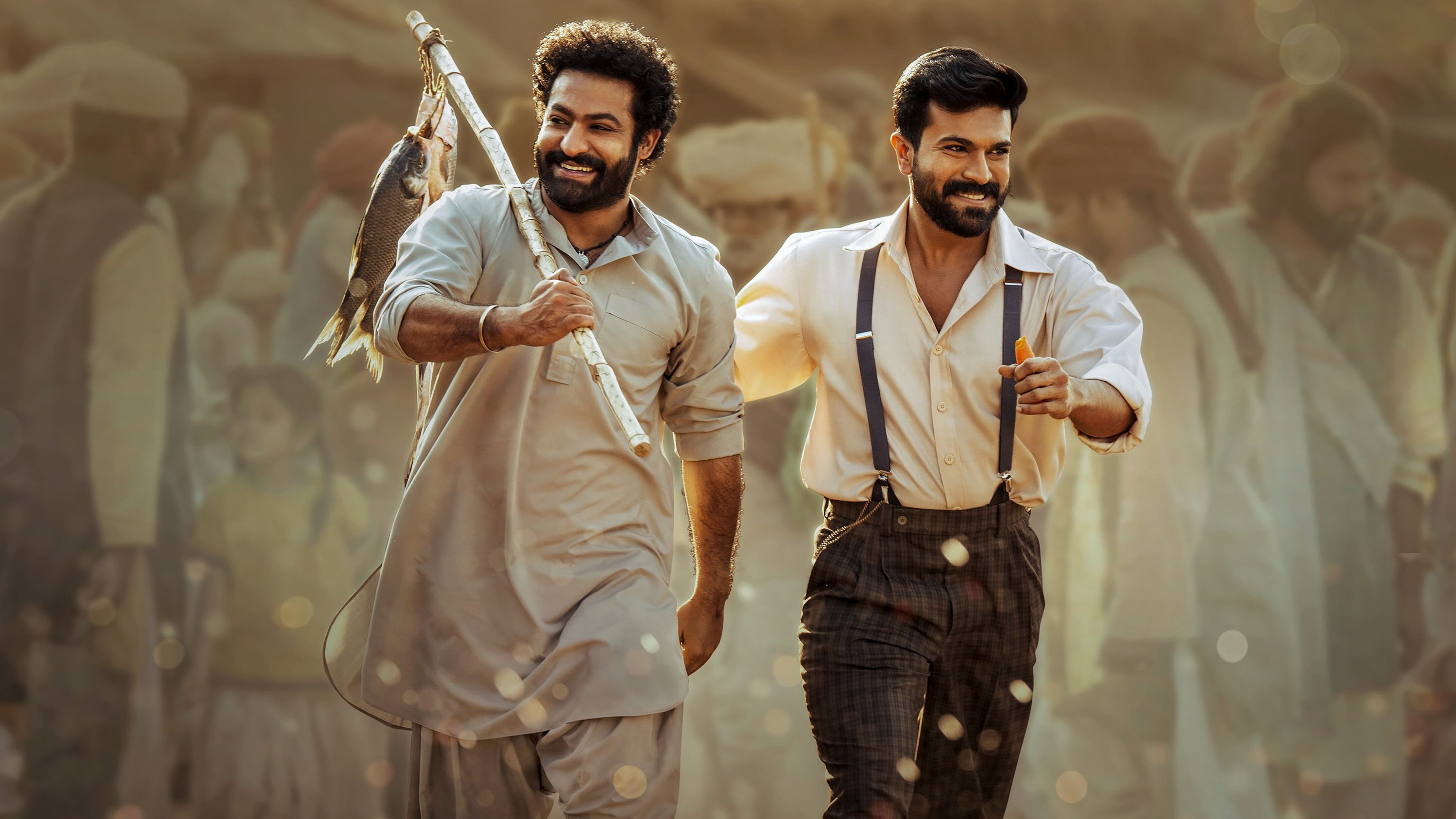 A poster of Telugu film 'RRR' featuring actors Jr. NTR and Ram Charan. Credit: PTI Photo