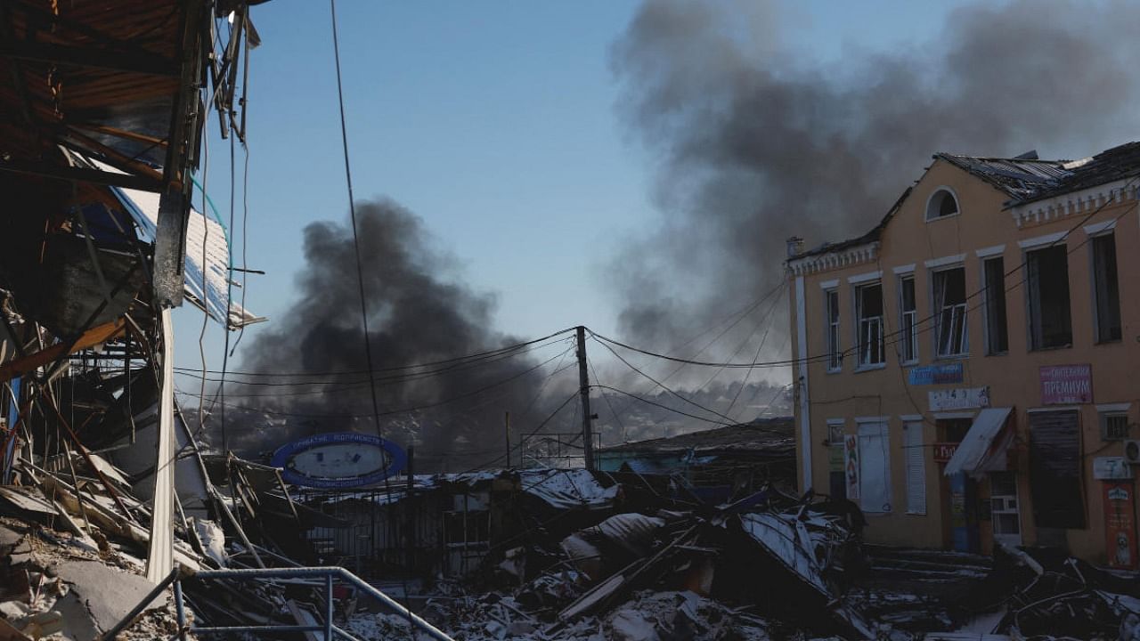 Plumes of smoke rise from a Russian strike during a 36-hour ceasefire over Orthodox Christmas declared by Russian President Vladimir Putin, from the frontline Donbas city of Bakhmut. Credit: Reuters photo