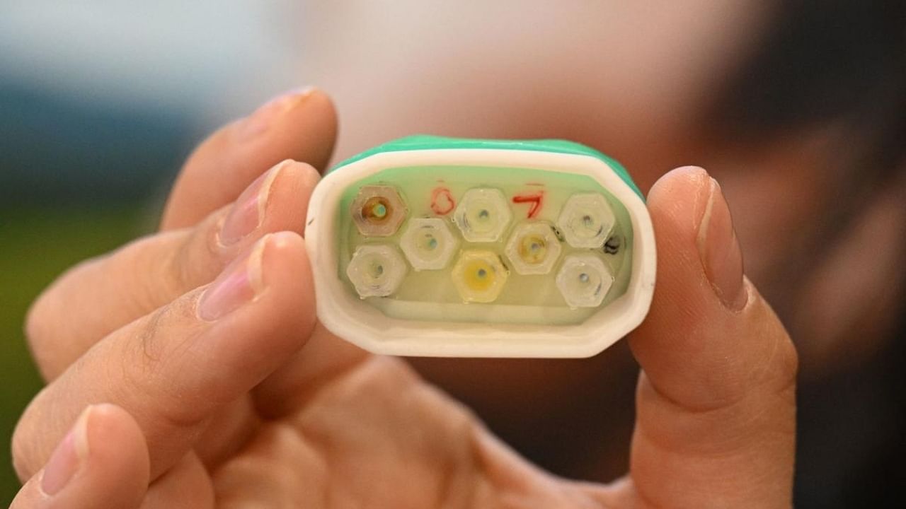 A scent cartridge of the ION 3, a wearable scent technology which delivers olfactory smells which correlate with items a user interacts with in the VR and AR environment. Credit: AFP Photo