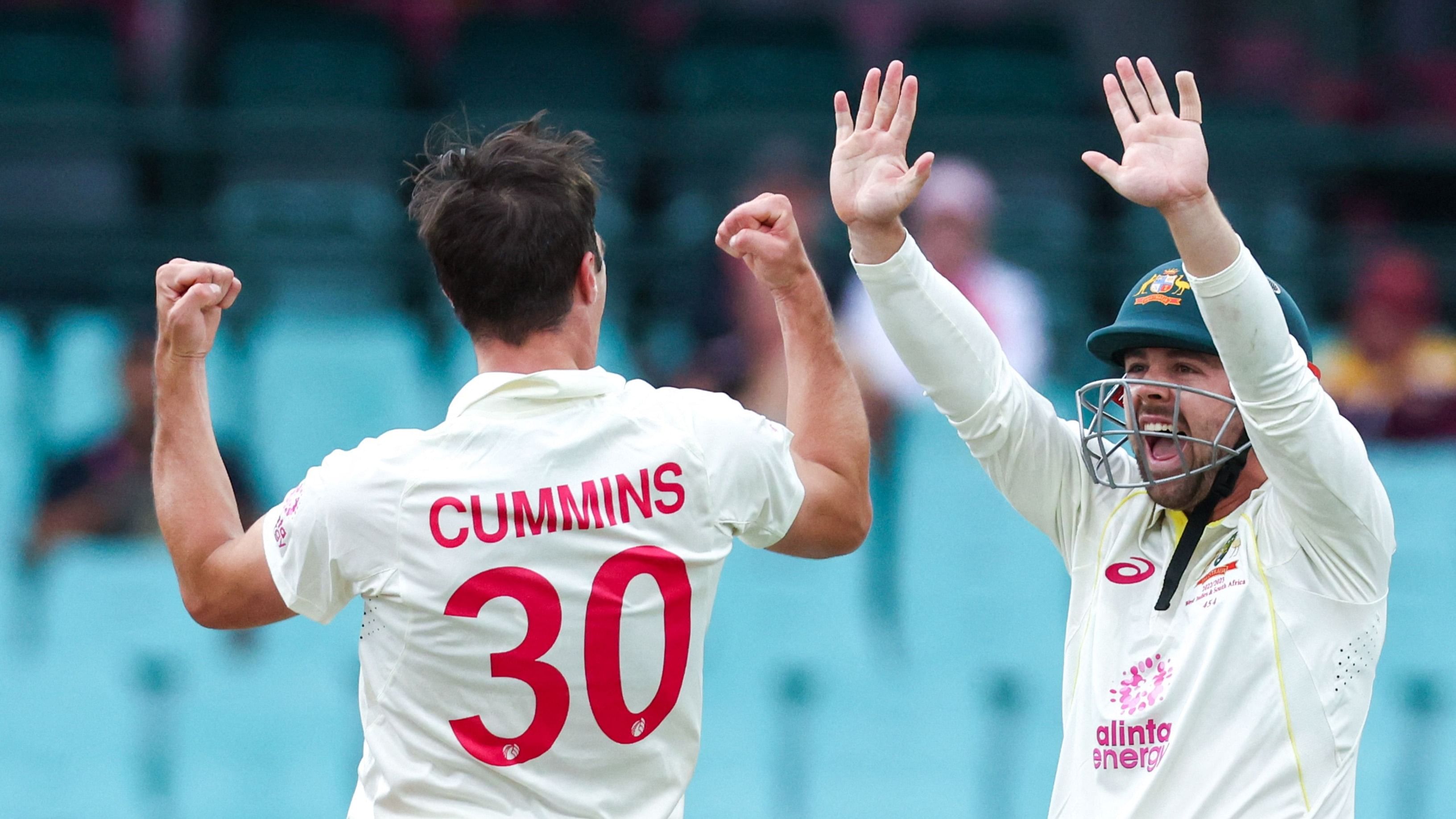 Australian captain Pat Cummins (L). Credit: AFP File Photo