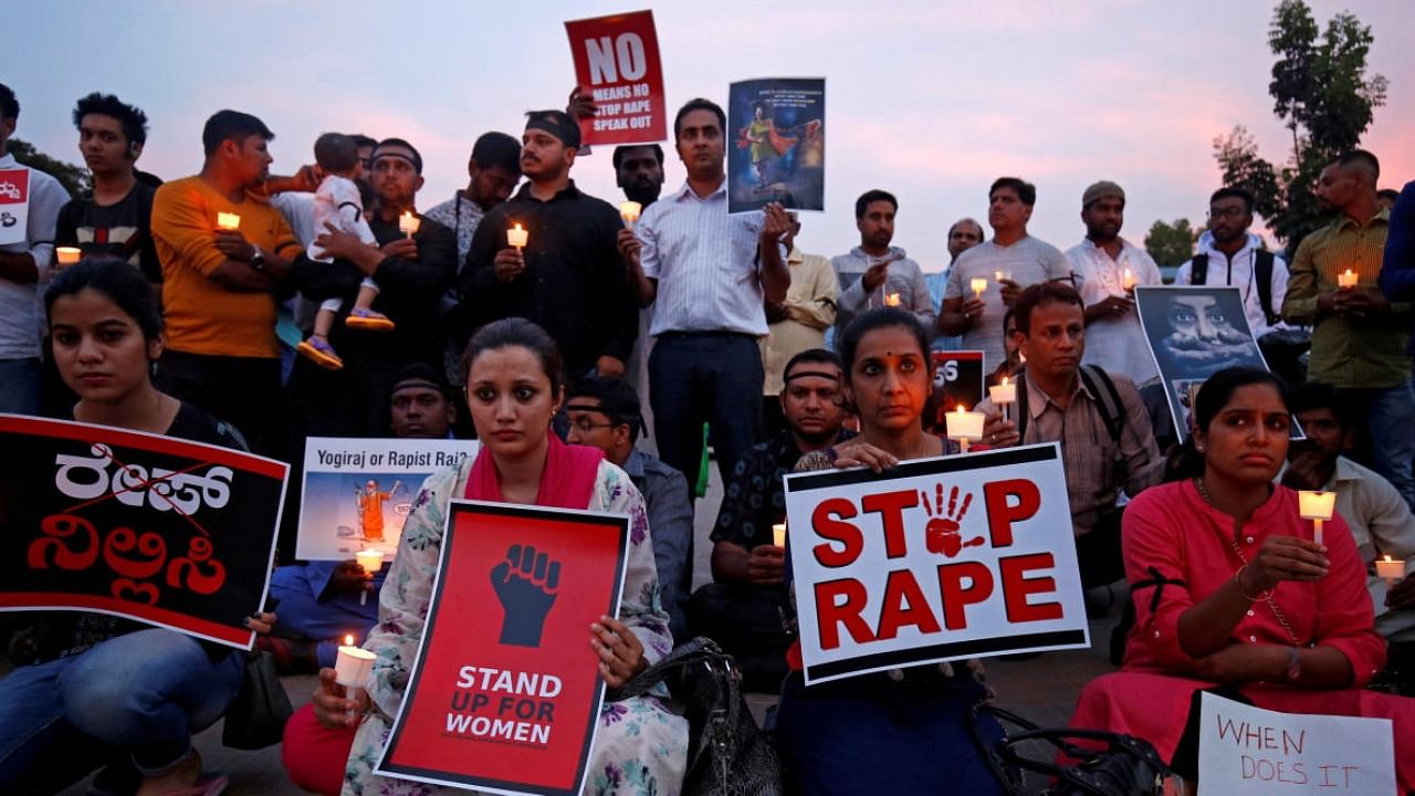 File photo of people protesting against Kathua gangrape case. Credit: PTI Photo