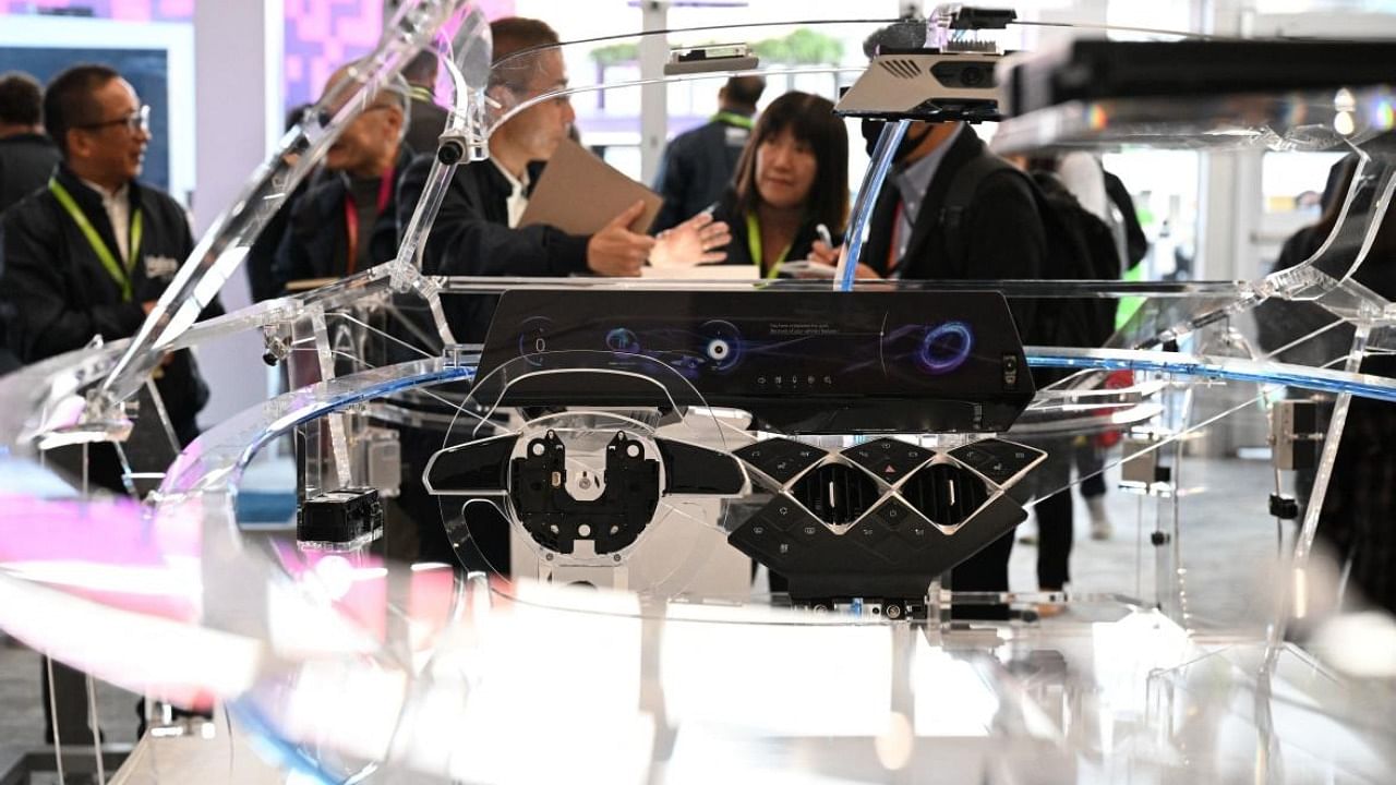 Examples of computing hardware architecture supporting an AR and IR environment inside a car at Valeo booth at the CES tech show. Credit: AFP Photo