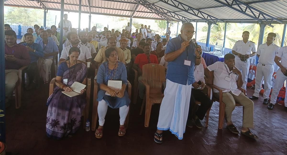 Shashi Kumar Bengre, representing purse seine fishing boat owners association, raises a point during an interaction programme with fishermen organised by the Indian Coast Guard Headquarters at Panambur. Credit: Special Arrangement