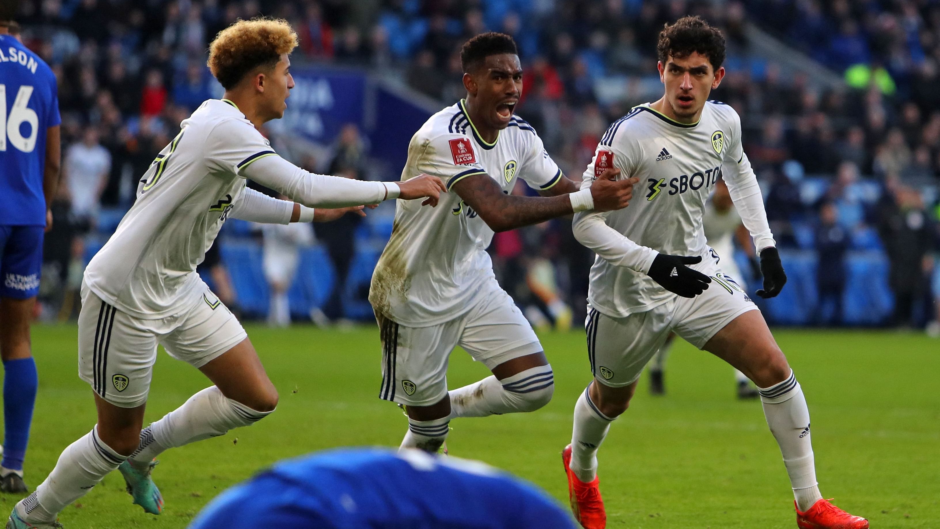 Leeds striker Sonny Perkins (R) celebrates with teammates after scoring their second goal during the FA Cup third round football match against Cardiff City. Credit: AFP Photo