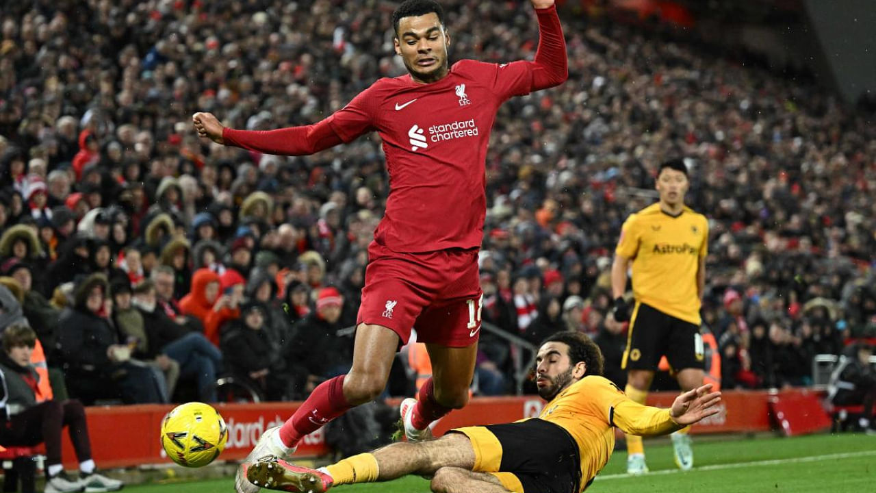 Liverpool and Wolves in the FA Cup game. Credit: AFP Photo
