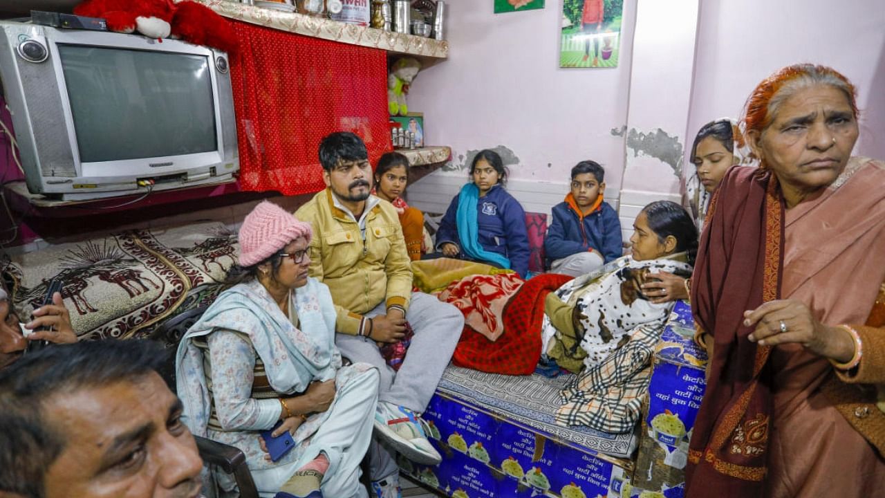 Family members of the Kanjhawala accident victim at their house. Credit: PTI File Photo