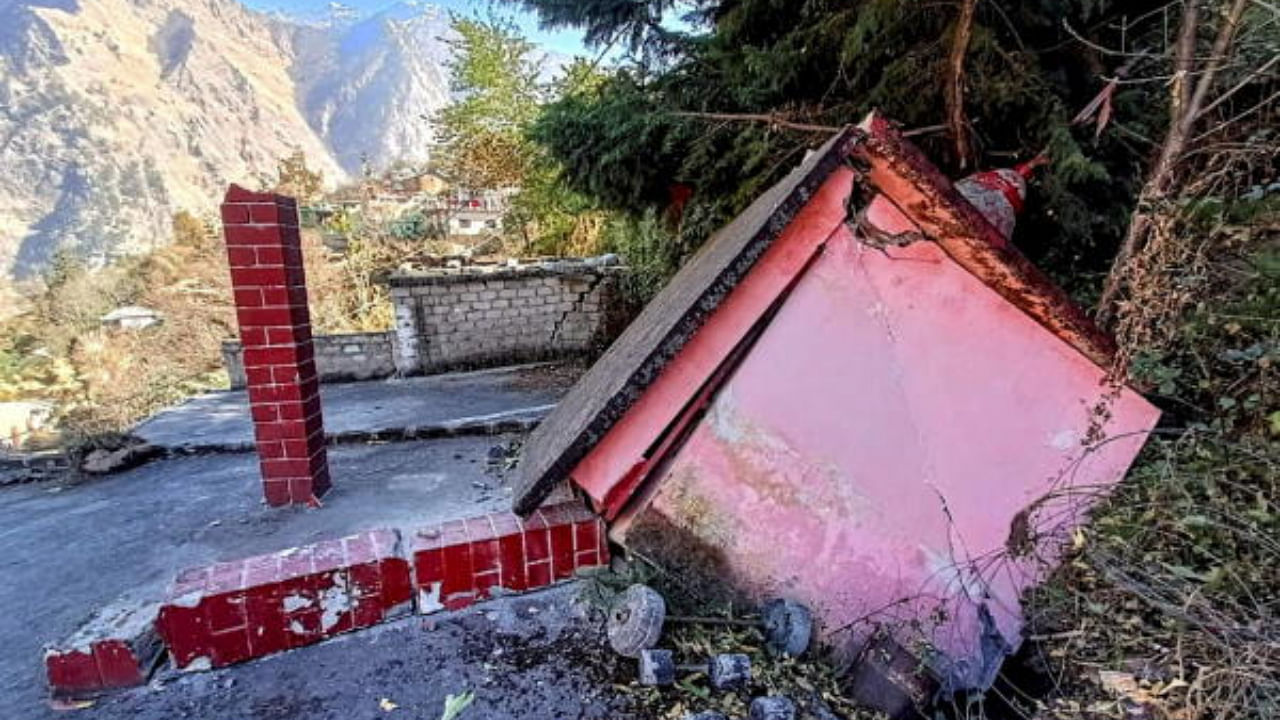 A temple collapses in Joshimath in Chamoli district of Uttarakhand on Sunday. Credit: PTI Photo