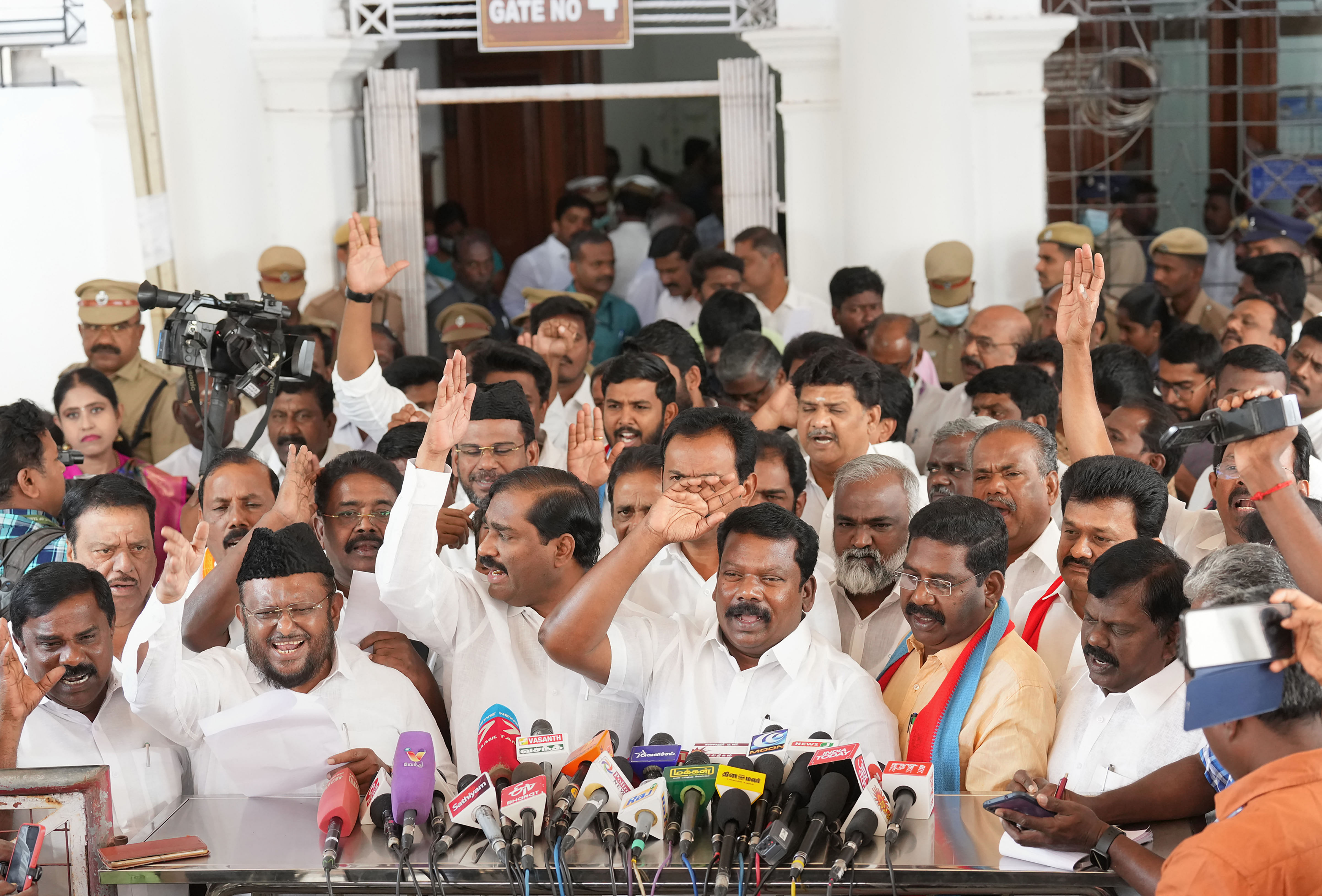 MLAs belonging to the ruling government and its allies speak with the media after staging a walkout during Tamil Nadu Governor's address at the first session of the year of Tamil Nadu Assembly, at Fort St George, in Chennai. Credit: PTI Photo