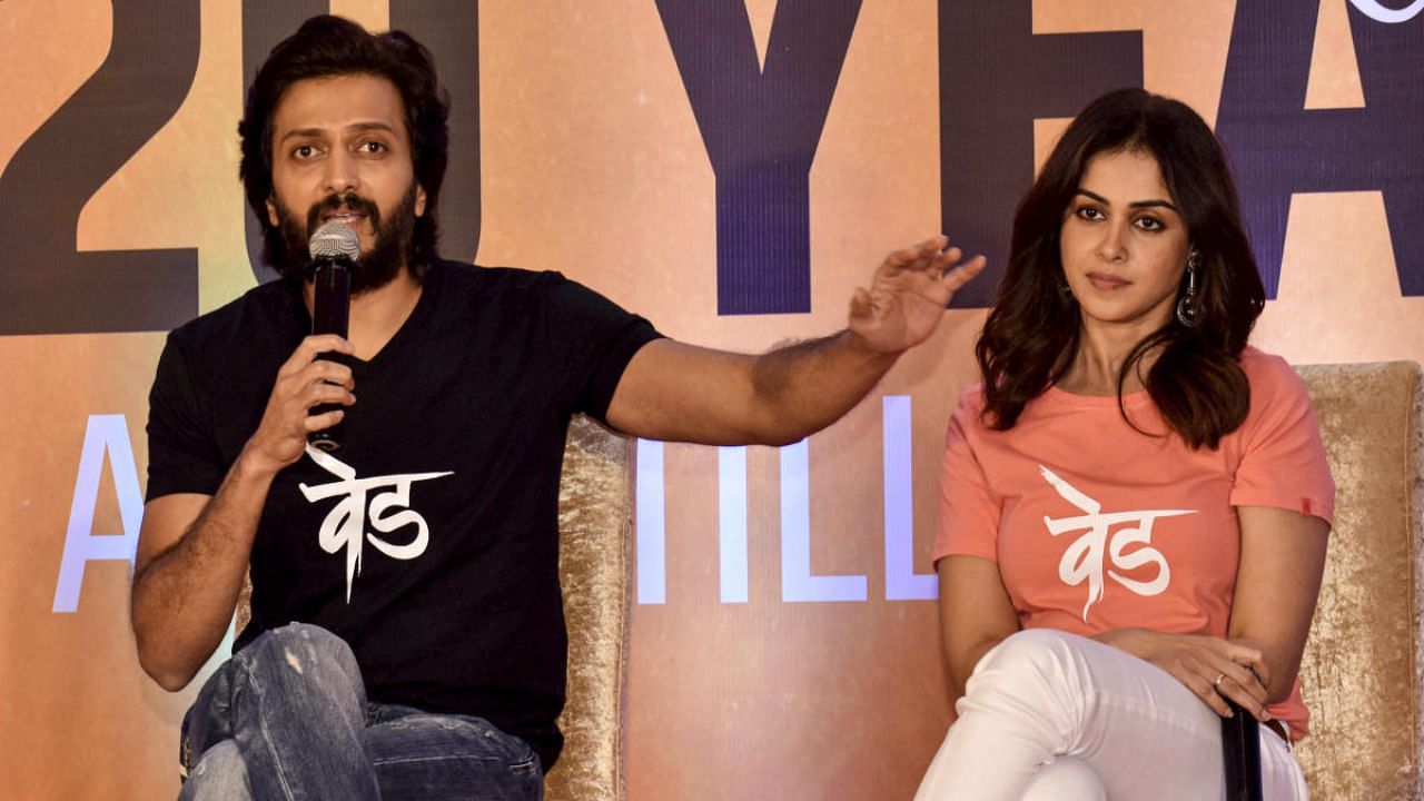 Bollywood actors Riteish Deshmukh with Genelia D'Souza. Credit: PTI Photo