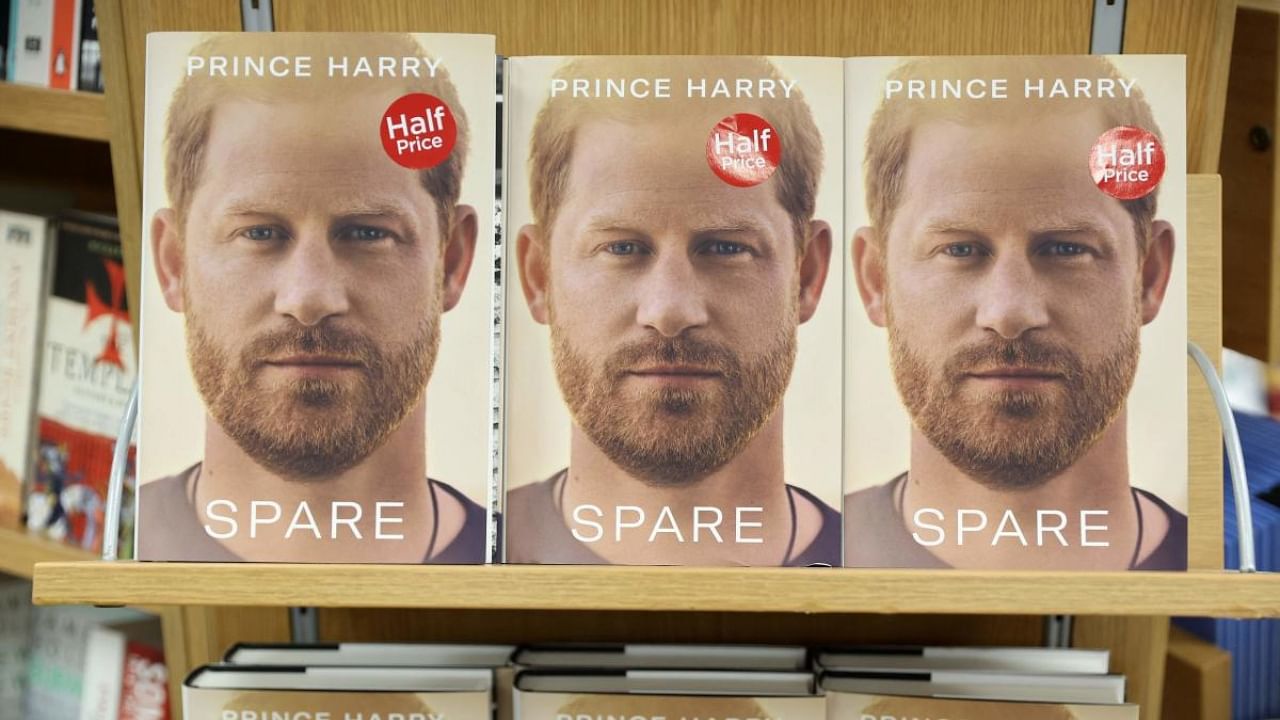 Copies of 'Spare' by Britain's Prince Harry, Duke of Sussex, are displayed during a special midnight opening at the WHSmith bookstore at Victoria Station in London early on January 10, 2023. Credit: AFP Photo
