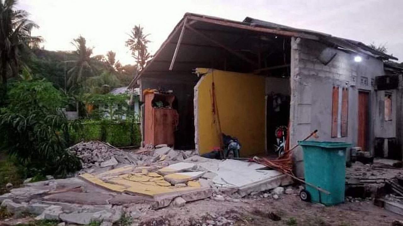 A damaged house after the 7.6-magnitude earthquake hit deep under the ocean off Indonesia and East Timor, in the Tanimbar islands in Maluku. Credit: AFP/BNPB
