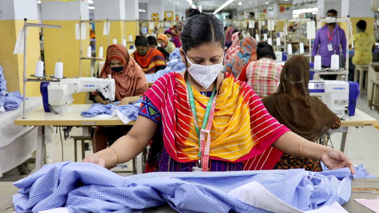 A woman works in a garment factory, as factories reopened after the government has eased the restrictions amid concerns over coronavirus disease (COVID-19) outbreak in Dhaka. Credit: Reuters File photo