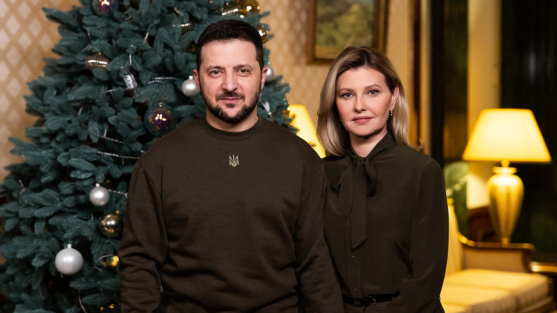 This handout picture taken and released by Ukrainian Presidential Office on December 31, 2022 shows the President Volodymyr Zelenskyy and his wife Olena during their New Year's address to Ukrainian people. Credit: AFP Photo
