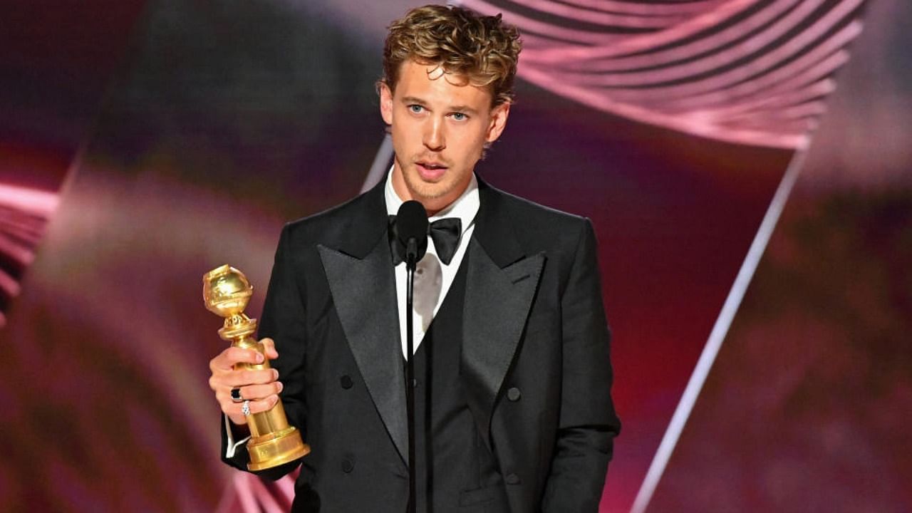 Austin Butler with his Golden Globe award for Elvis. Credit: Reuters